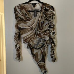 Brand new with tag PLT bodysuit. Cutout on the stomach.